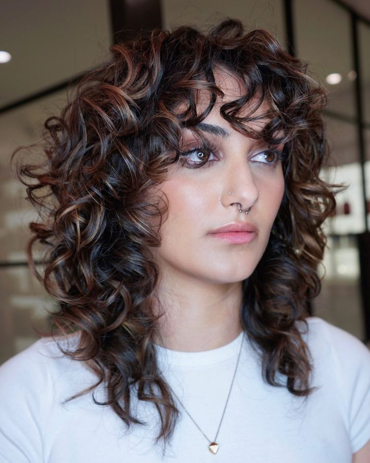 Curly Bangs Collarbone Dark Brown Caramel Highlights — Curly Wolf Cut
