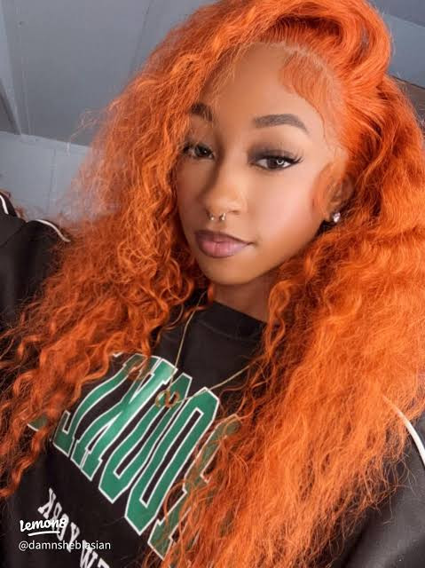 Vibrant Orange Mid-Back Voluminous Curls — Colored Wig Styles