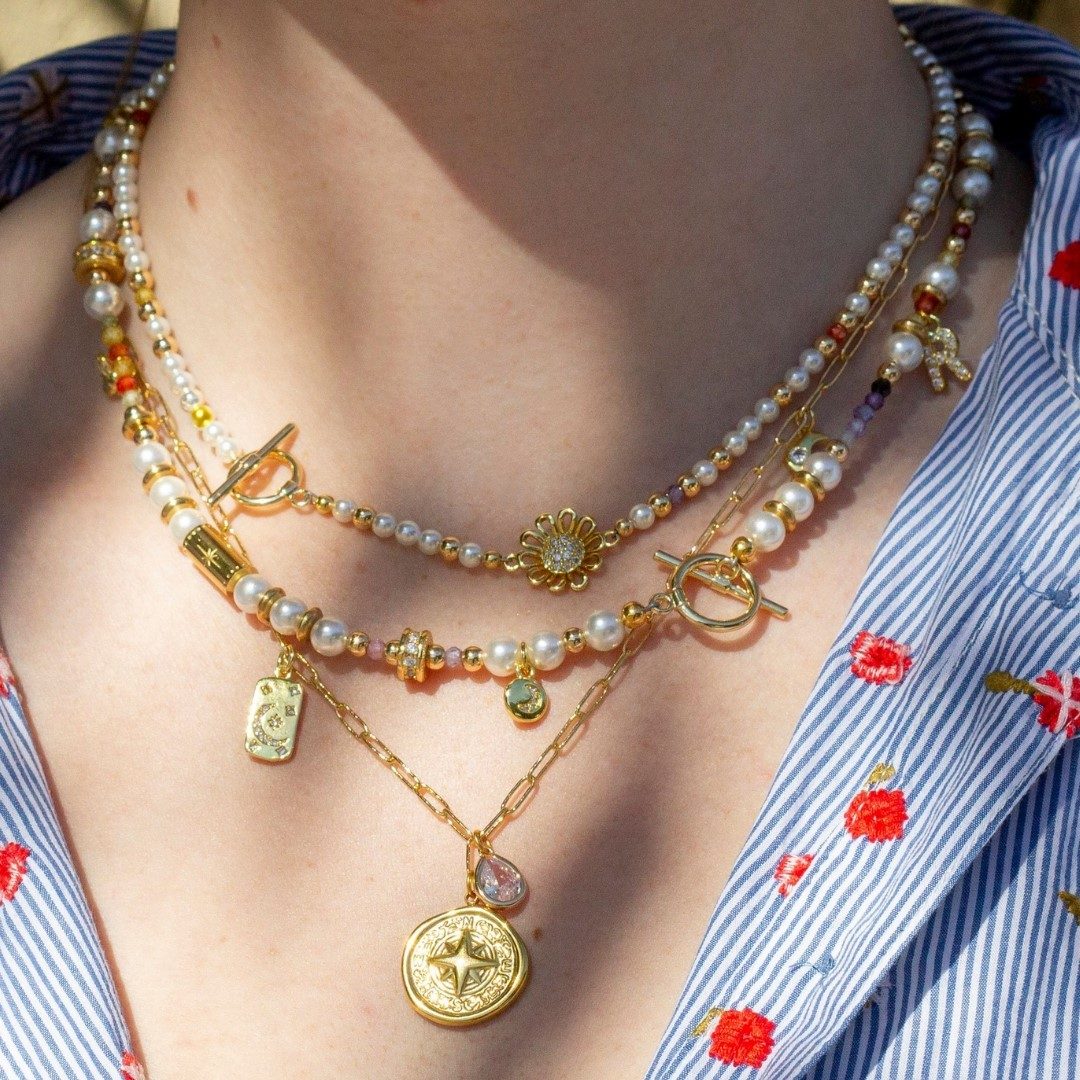 Pearls Metal Beads Smooth Fabric Outfit Idea Pearls Metal Beads Smooth Fabric Outfit Idea — Layered Necklaces