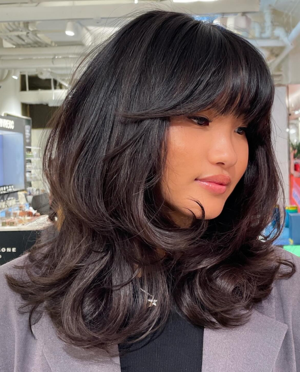 Collarbone Visual Idea — Medium Hair with Bangs