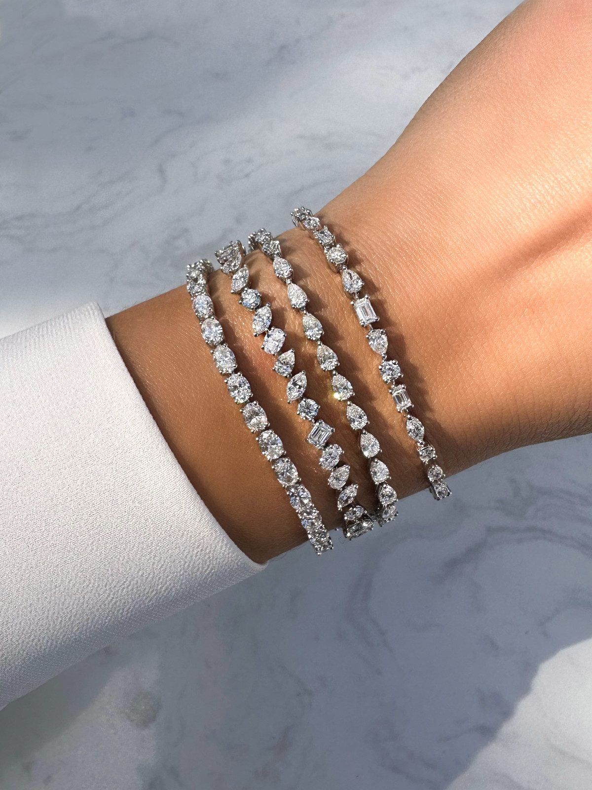 Artful Arrangement: Assorted Diamond Cuts on Wrist Artful Arrangement: Assorted Diamond Cuts on Wrist — Tennis Bracelets
