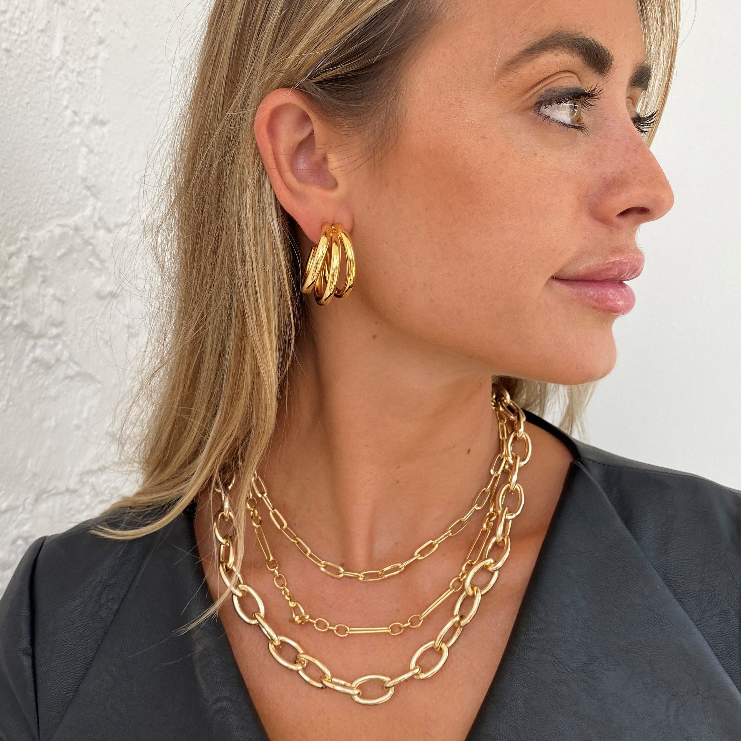 Chunky Layered Gold Necklaces with Black Leather Jacket Chunky Layered Gold Necklaces with Black Leather Jacket — Chunky Jewelry