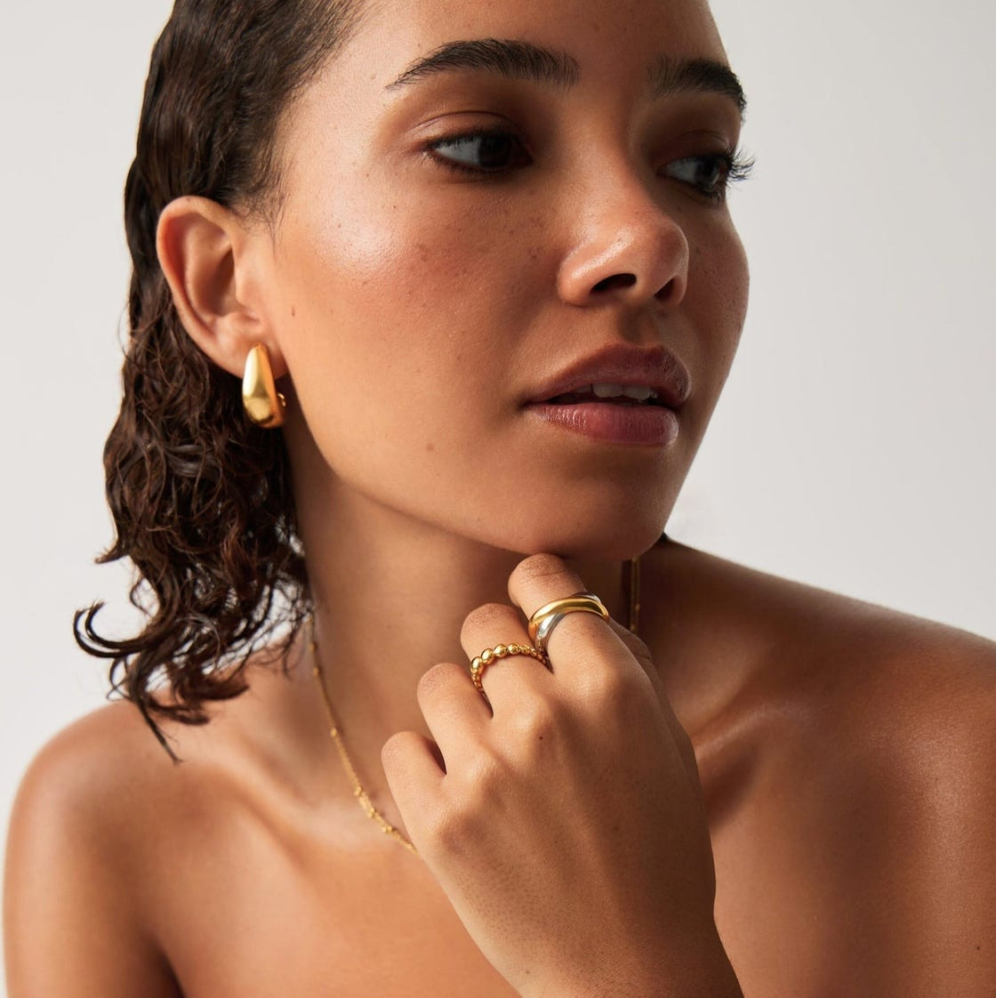 Stacked Gold Rings and Hoop Earrings Stacked Gold Rings and Hoop Earrings — Mixed Metal Jewelry