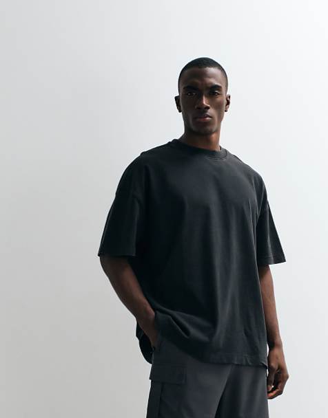 Casual Cool: Washed Black Oversized Tee and Dark Grey Cargo Pants — Mens Gym Outfits