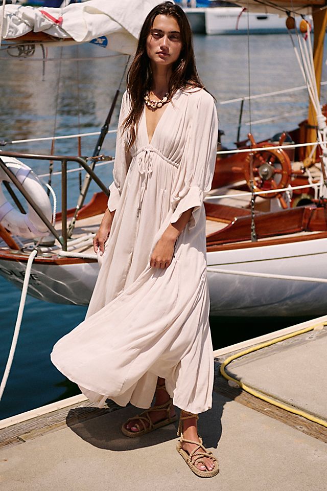 Flowing Off-White Maxi Dress with Deep V-Neck Flowing Off-White Maxi Dress with Deep V-Neck — Free People Outfits