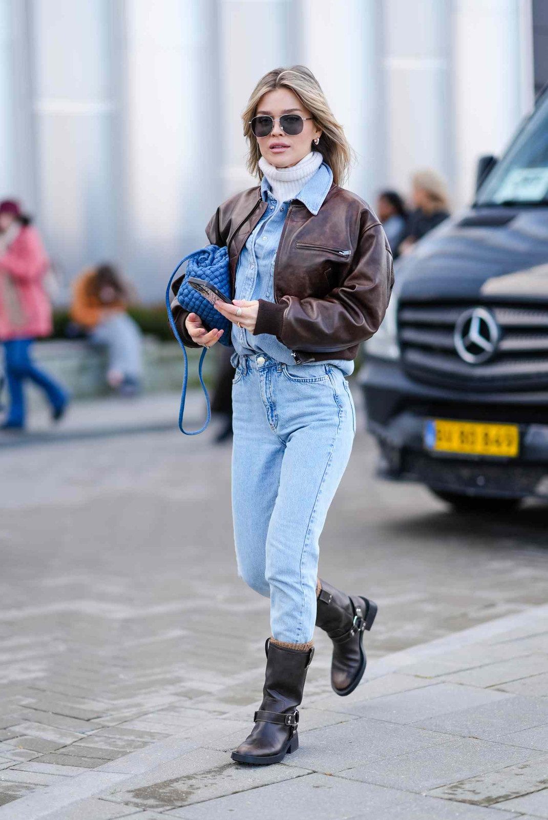 Denim Jumpsuit and Bomber Jacket with Biker Boots Denim Jumpsuit and Bomber Jacket with Biker Boots — Cowboy Boots with Jeans Outfits