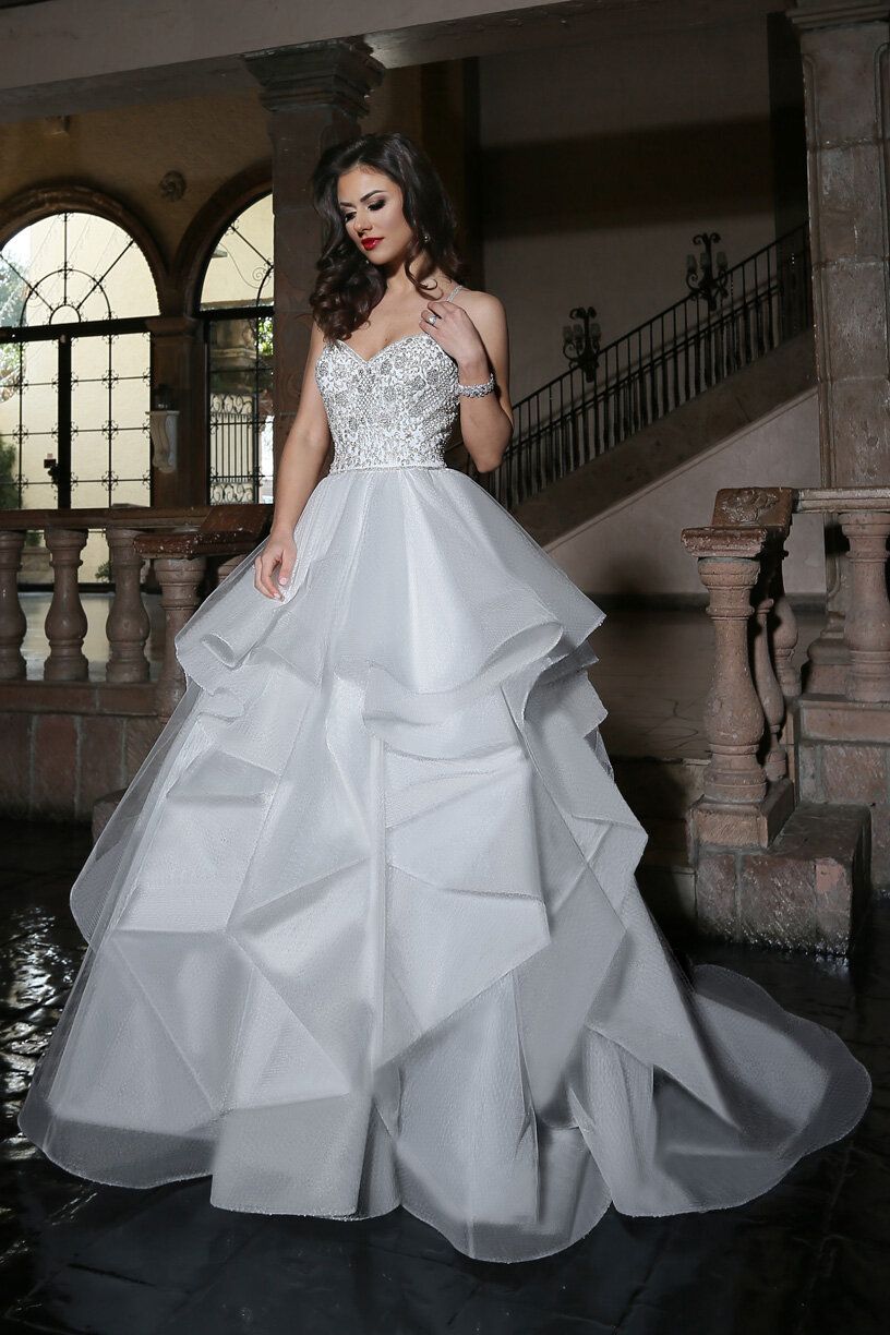 White Ball Gown with Beaded Bodice and Tiered Skirt White Ball Gown with Beaded Bodice and Tiered Skirt — Ball Gowns