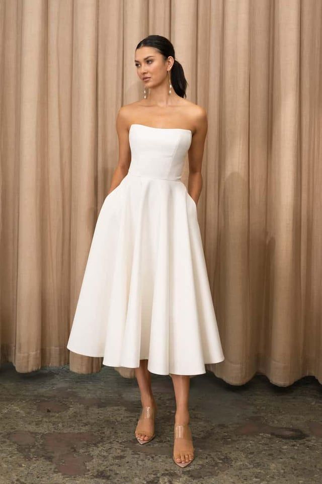White Strapless A-Line Midi Dress with Full Skirt and Pockets White Strapless A-Line Midi Dress with Full Skirt and Pockets — Tea Length Dresses