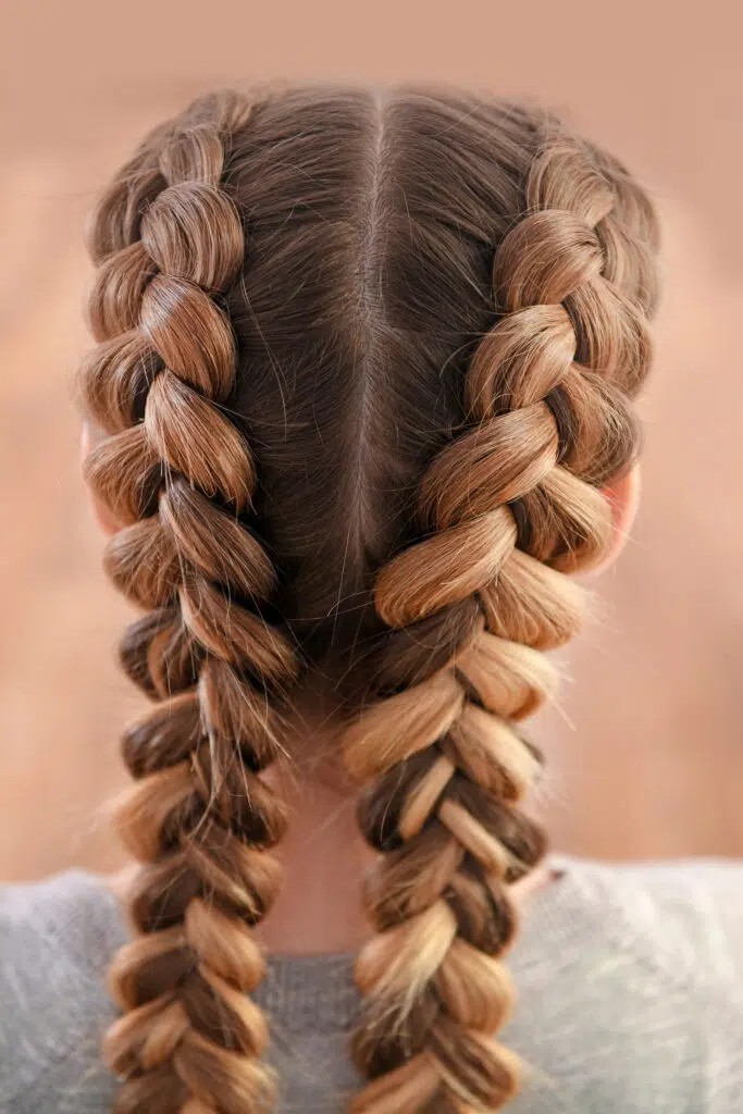 Thick Dutch Braids With Blonde Highlights Thick Dutch Braids With Blonde Highlights — Dance Competition Hairstyles