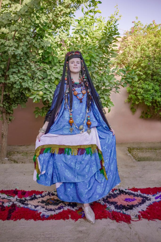 Vibrant Blue Tiered Dress with Elaborate Beaded Jewelry Vibrant Blue Tiered Dress with Elaborate Beaded Jewelry — Morocco Outfits