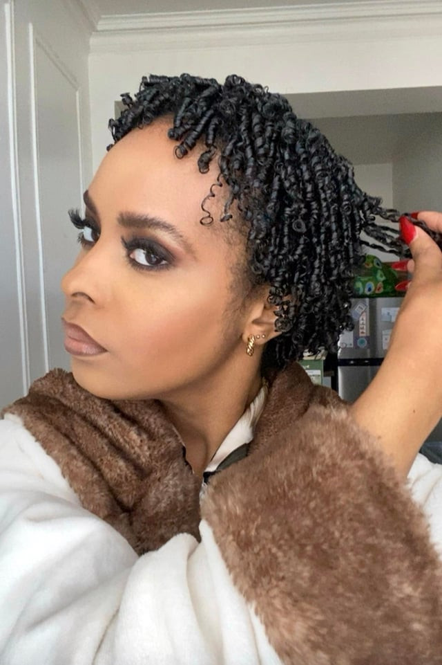 Neat Black Finger Coils With Bangs