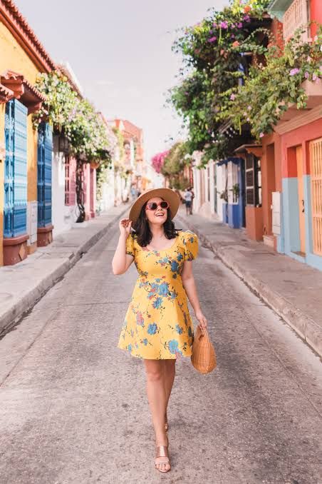 Sunny Yellow Florals: Puff-Sleeve Mini Dress with Straw Accessories — Cartagena Outfits