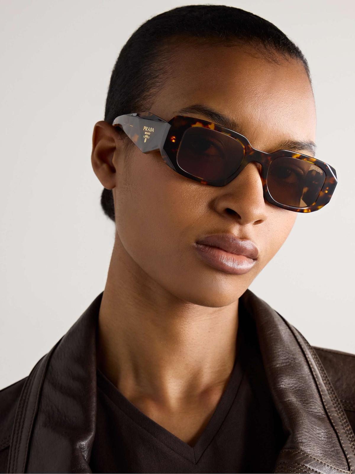 Angular Tortoiseshell Sunglasses With Leather Jacket Angular Tortoiseshell Sunglasses With Leather Jacket — Sunglasses for Square Face