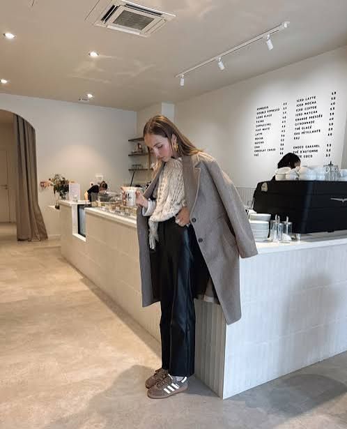 Elevated Casual: Brown Adidas Spezial with Leather Pants and Cable Knit Elevated Casual: Brown Adidas Spezial with Leather Pants and Cable Knit — Adidas Spezial Outfits