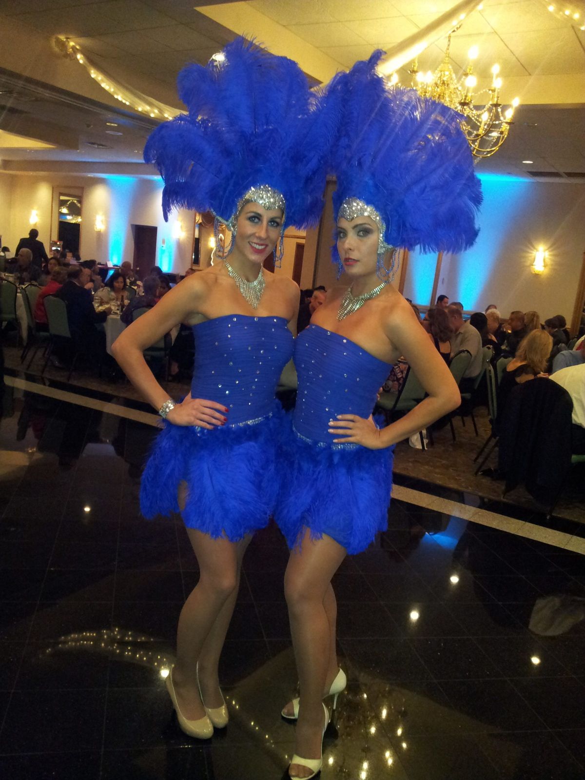 Blue Feathers and Sequins: Strapless Dresses for a Grand Entrance Blue Feathers and Sequins: Strapless Dresses for a Grand Entrance — Vegas Show Outfits