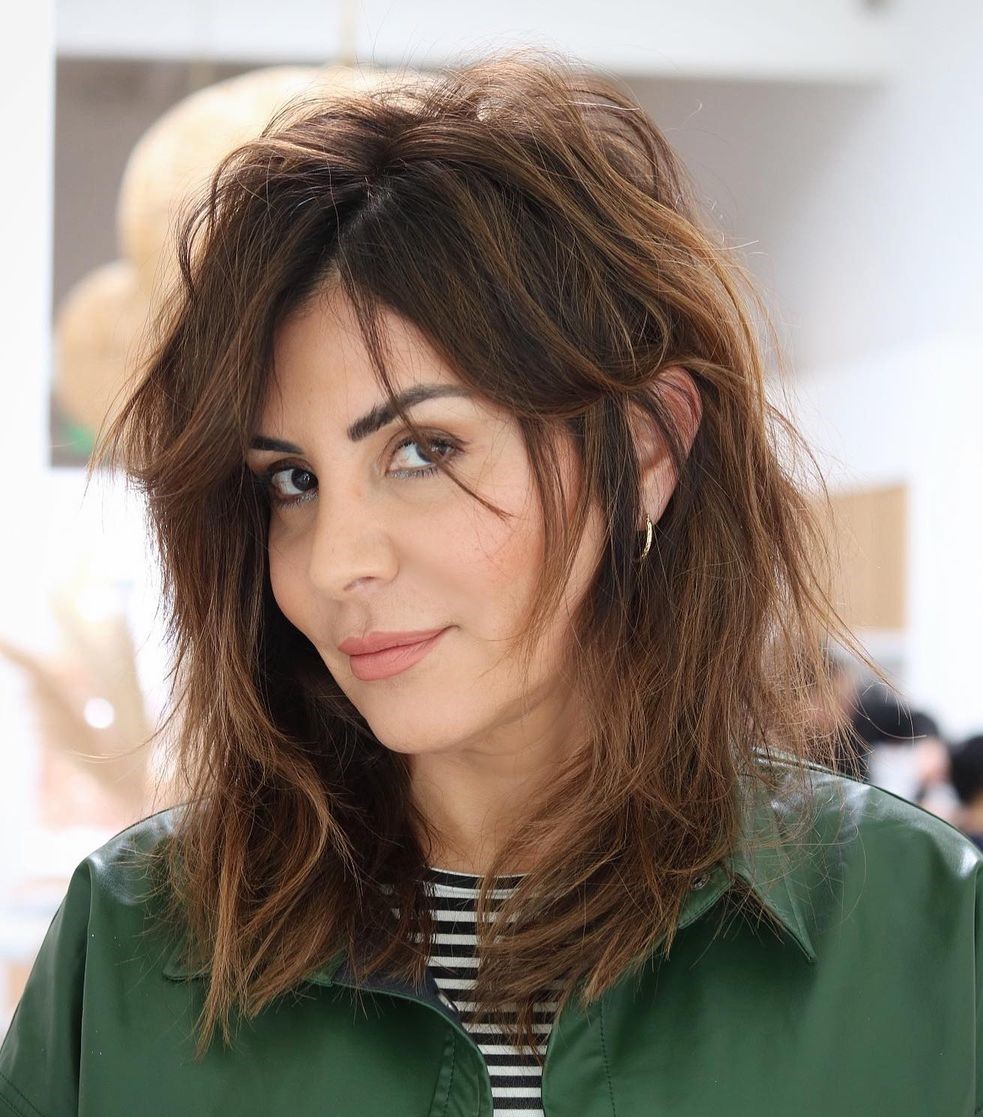 The Air-Dried Shag with Curtain Bangs The Air-Dried Shag with Curtain Bangs — Messy Hairstyles