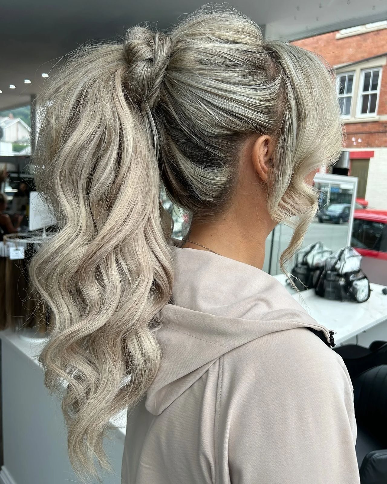 Voluminous Ash Blonde Ponytail Voluminous Ash Blonde Ponytail — Ponytail with Curtain Bangs