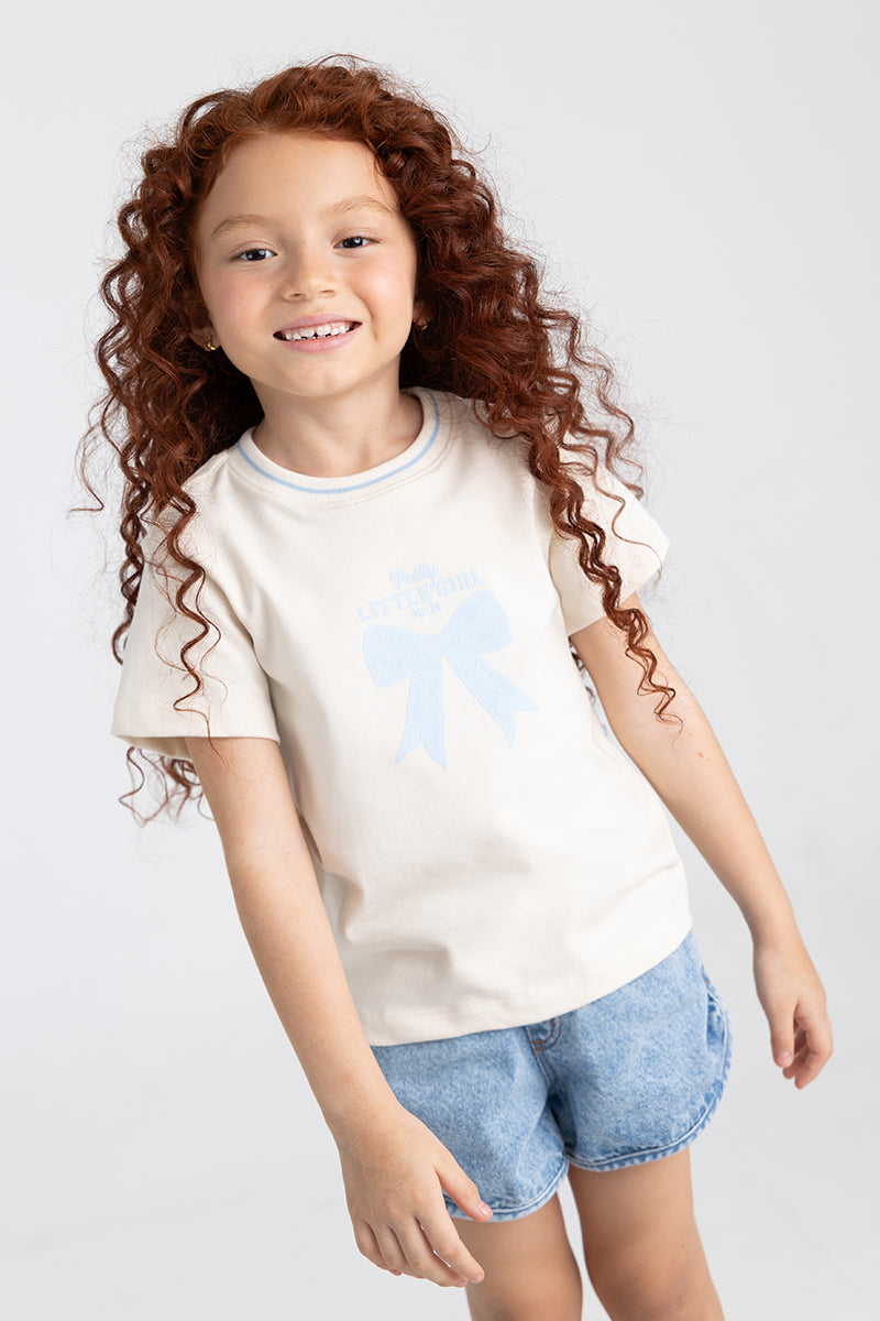 Casual Cream Tee with Denim Shorts and Bow Graphic Casual Cream Tee with Denim Shorts and Bow Graphic — Toddler Girl Outfits