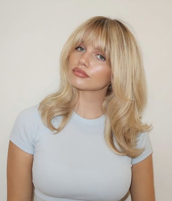 Light Blue Ribbed T-Shirt and Blonde Wispy Bangs