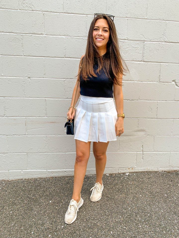 White Pleated Tennis Skirt with Black Sleeveless Knit Top White Pleated Tennis Skirt with Black Sleeveless Knit Top — Tennis Skirt Outfits
