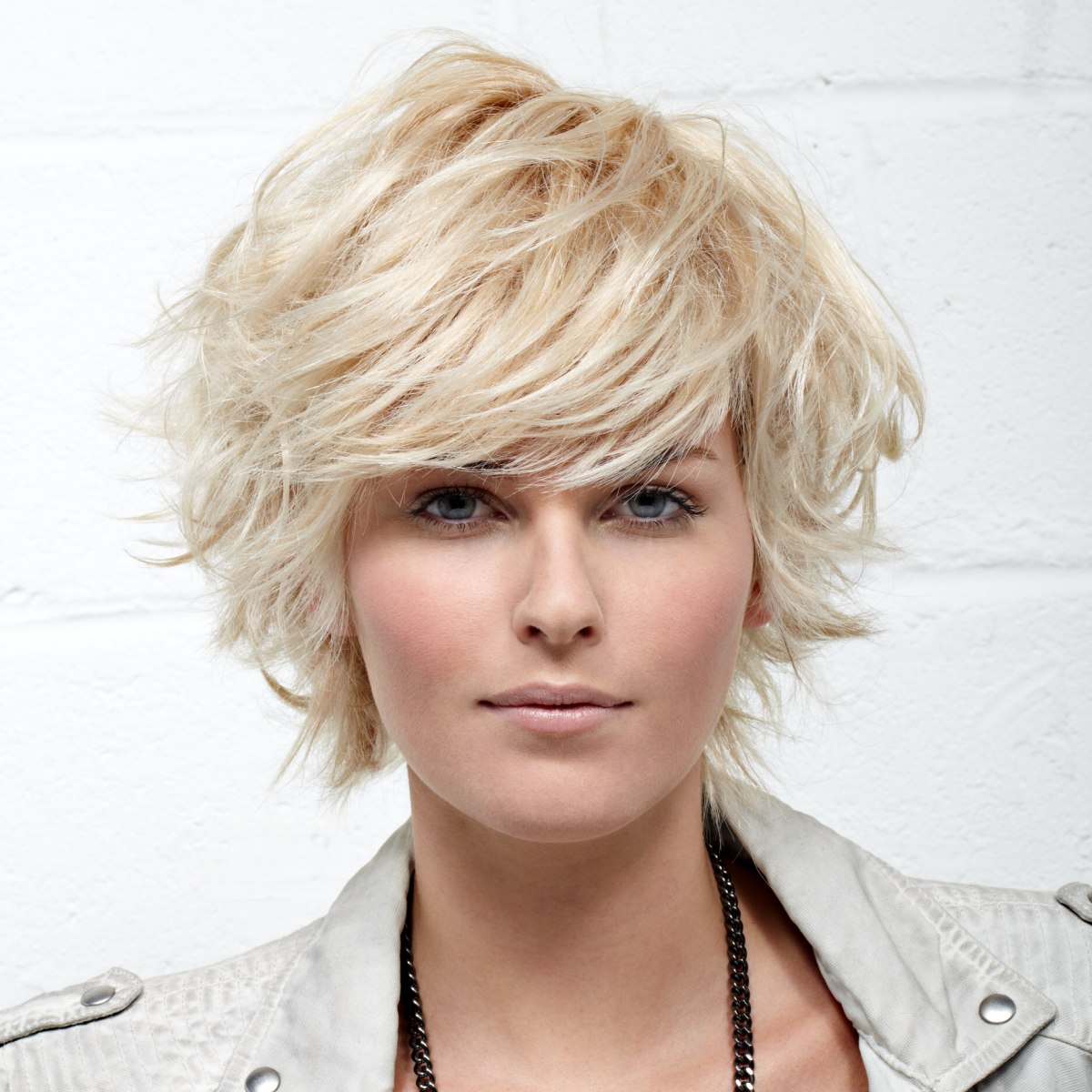 Ash Blonde Ear-Length Shag Ash Blonde Ear-Length Shag — Short Layered Hair