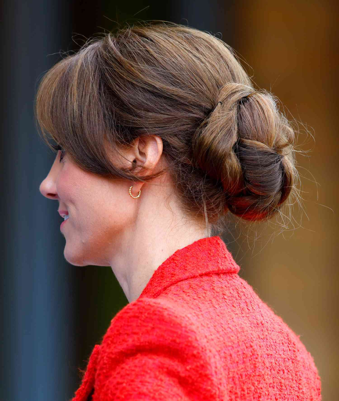 Braided Medium Brown Bun with Bangs Braided Medium Brown Bun with Bangs — Low Bun with Curtain Bangs
