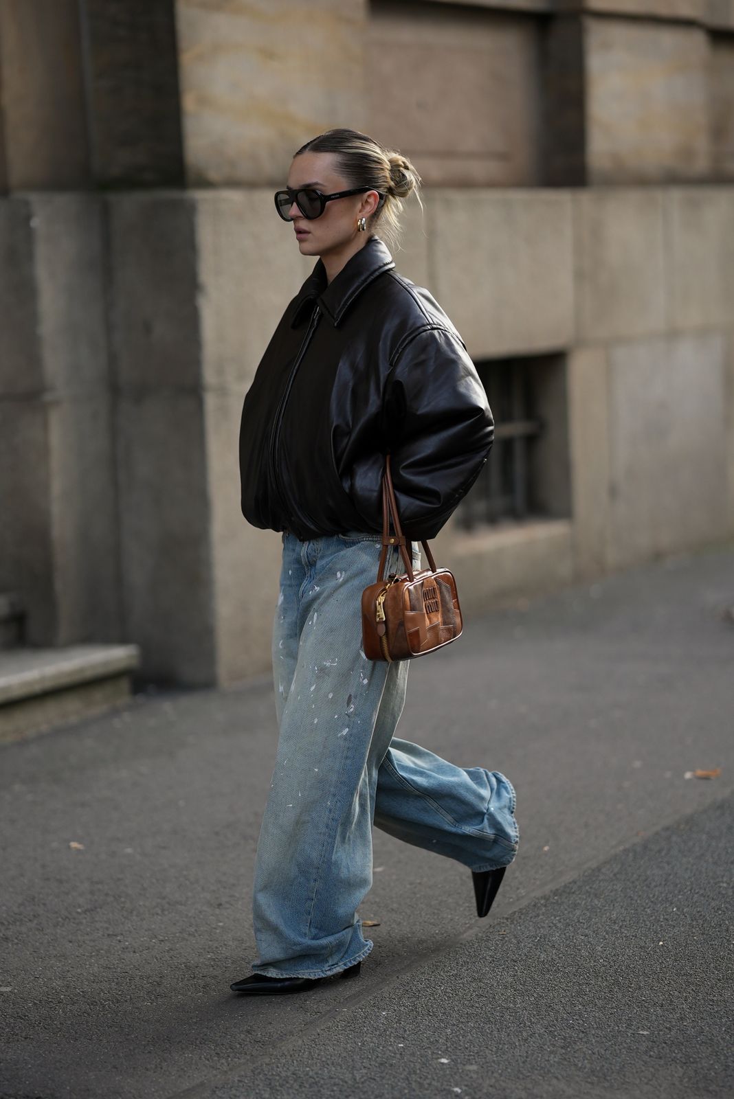 Street Style Statement: Wide Leg Jeans with a Bomber Jacket — Light Wash Jeans Outfits