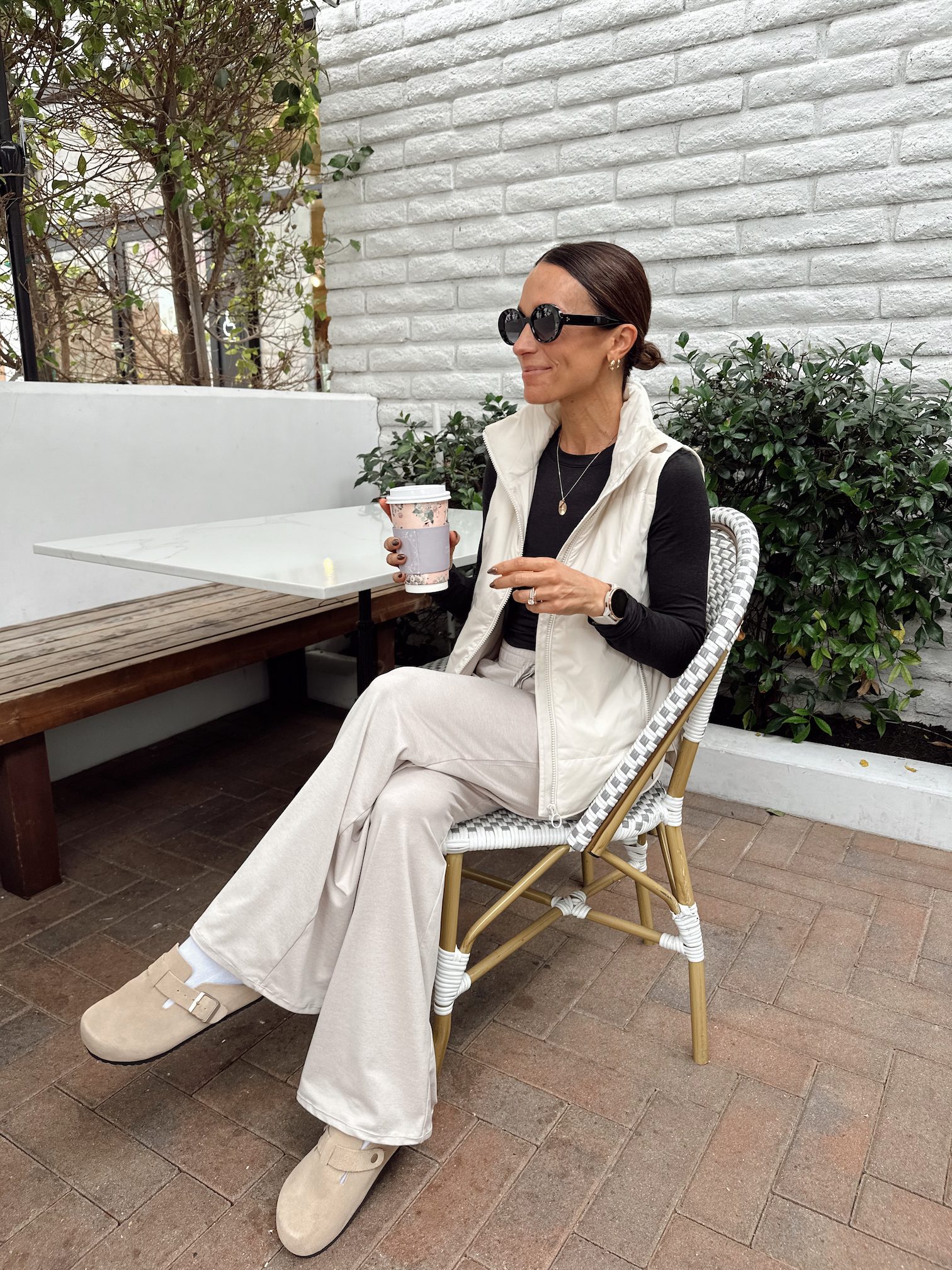 Suede Clogs with Flared Trousers and Puffer Vest — Clog Outfits