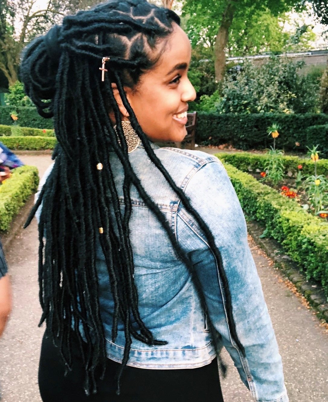 Black Locs Updo with Loose Ends Black Locs Updo with Loose Ends — Loc Styles for Work