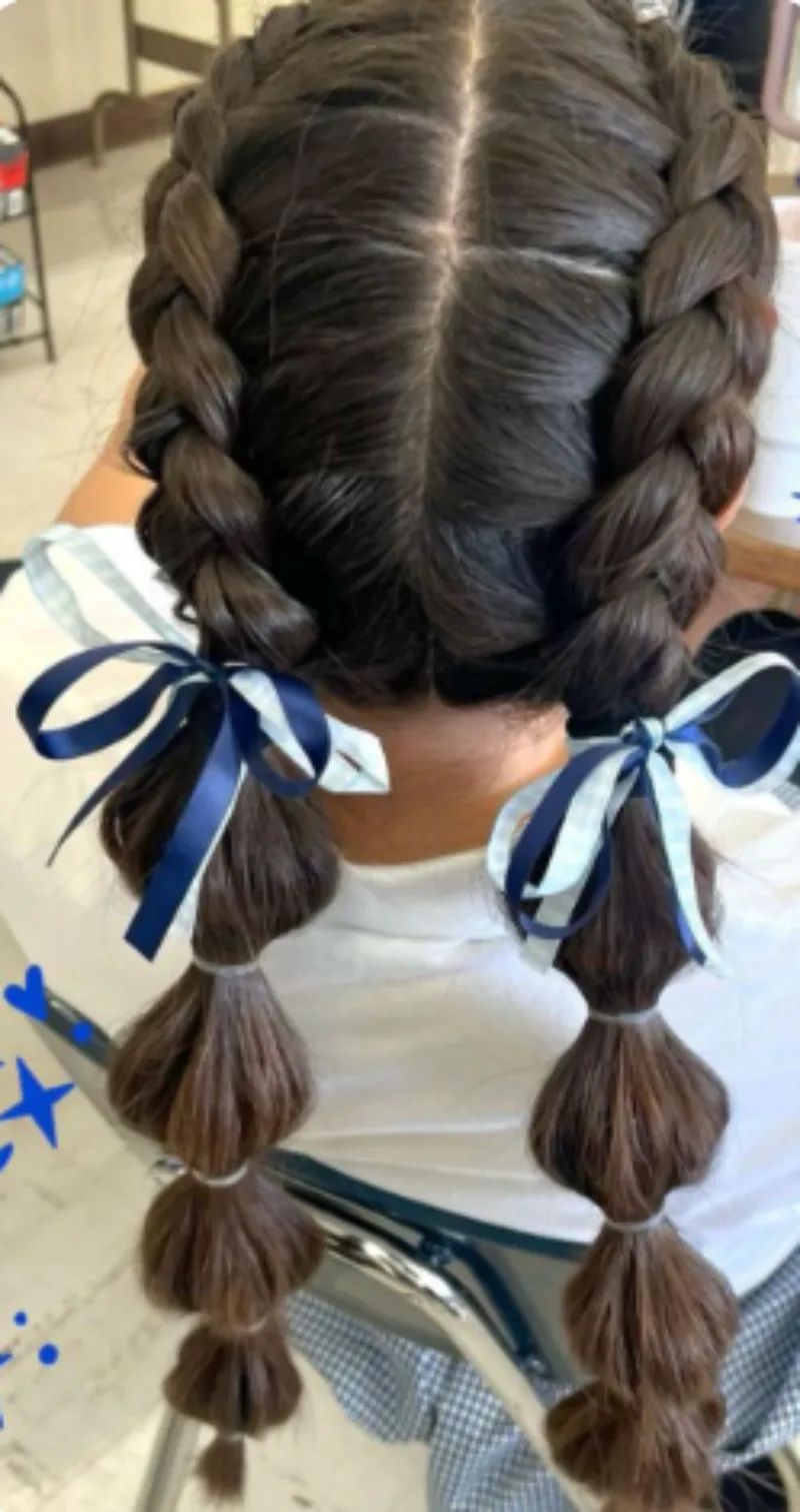 Intricate Dark Brown Fishtail Braids With Beads Intricate Dark Brown Fishtail Braids With Beads — Softball Hairstyles