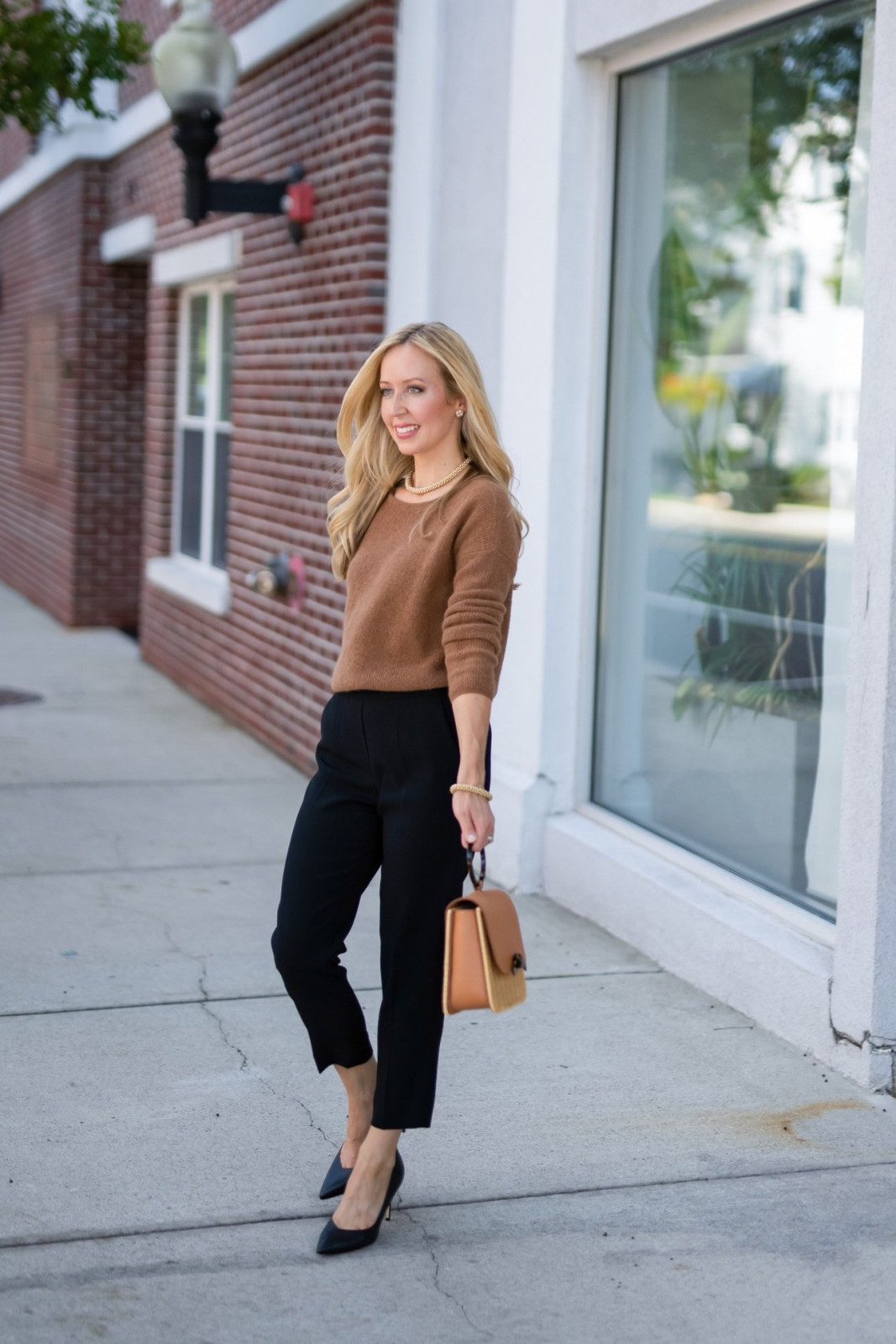 Relaxed Knit Sweater Paired with Cropped Trousers for Casual Workdays Relaxed Knit Sweater Paired with Cropped Trousers for Casual Workdays — Social Worker Outfits