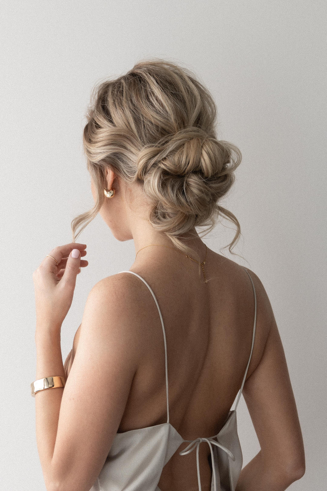 Tousled Dark Brown Messy Low Bun