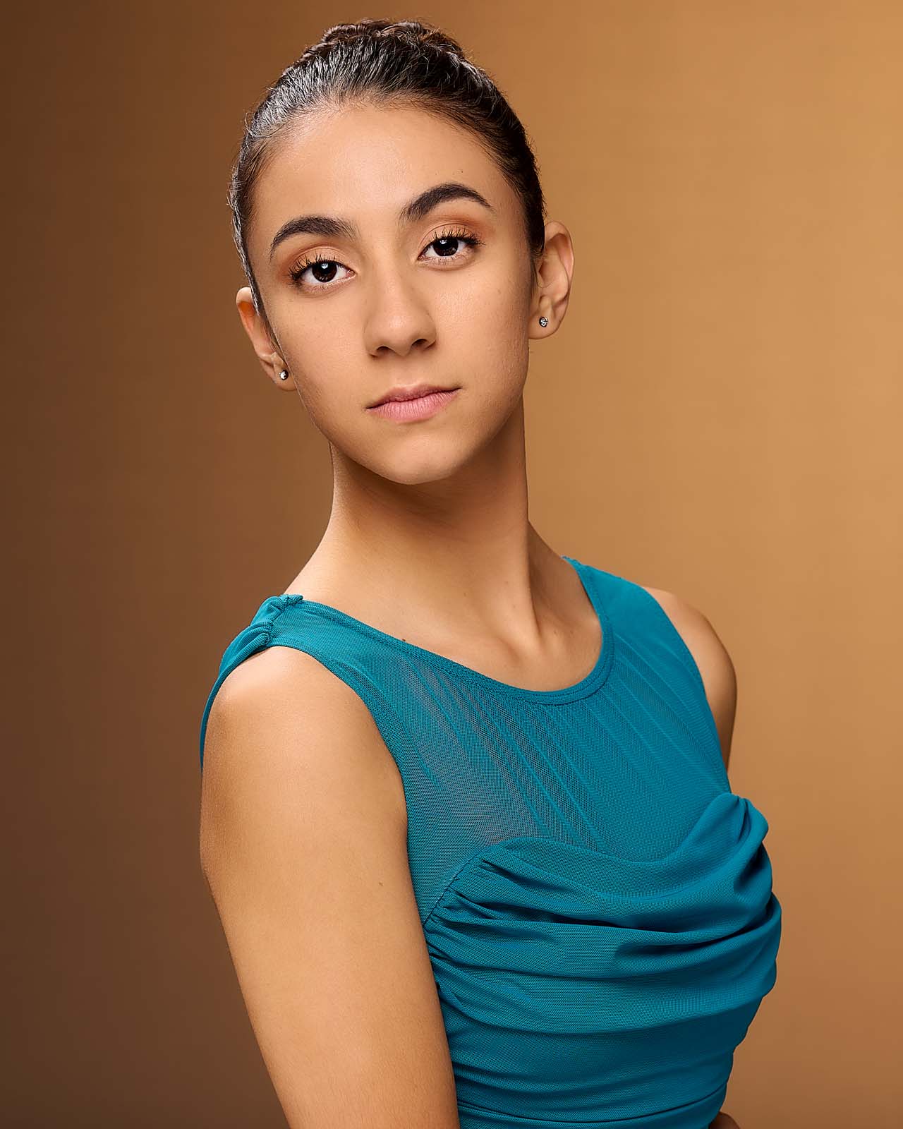 Modern Detail: Teal Ruched Top with Mesh for an Artistic Headshot — Headshot Outfits