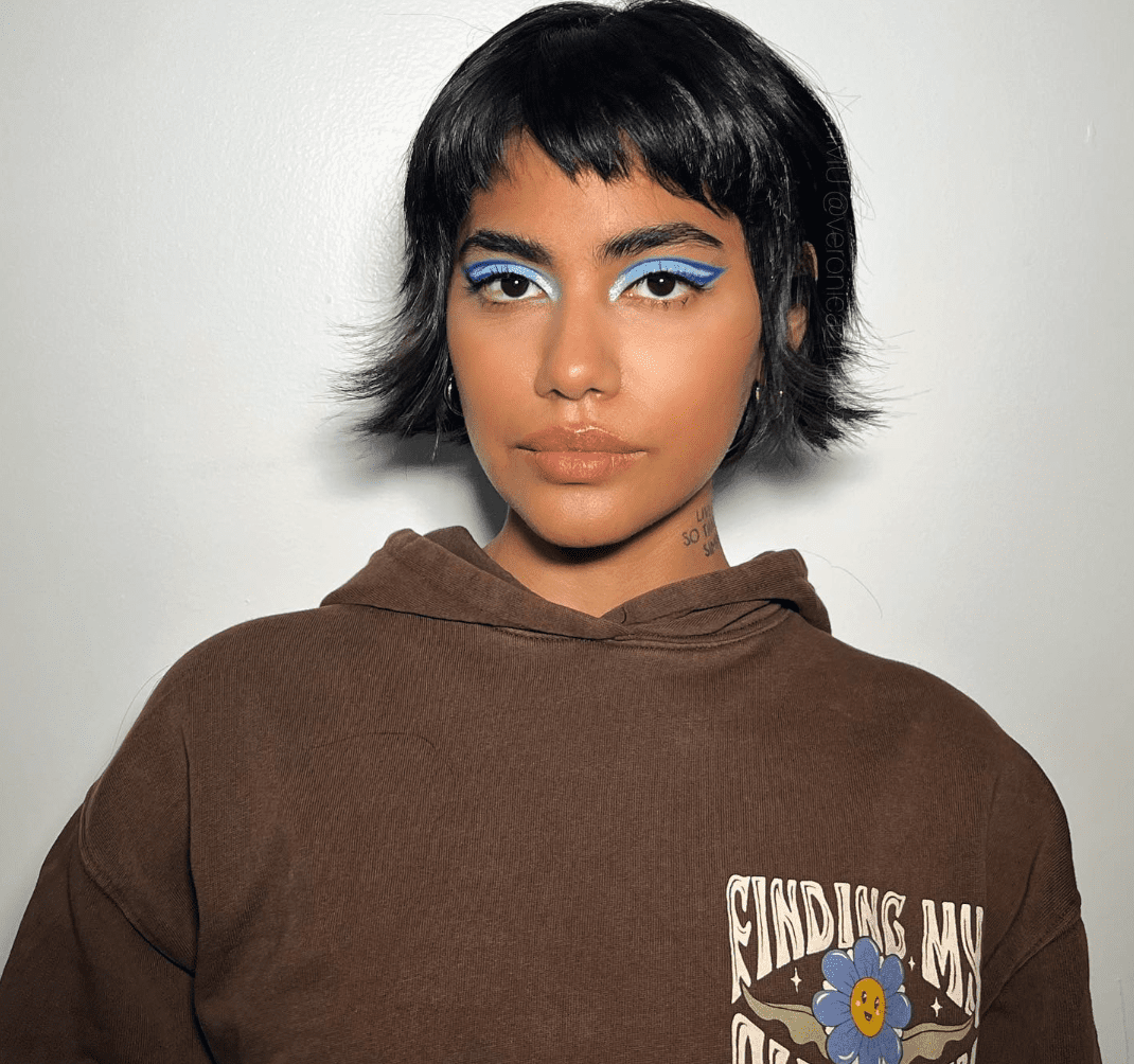 Choppy Black Hair with Bangs and an Oversized Hoodie — Short Bangs