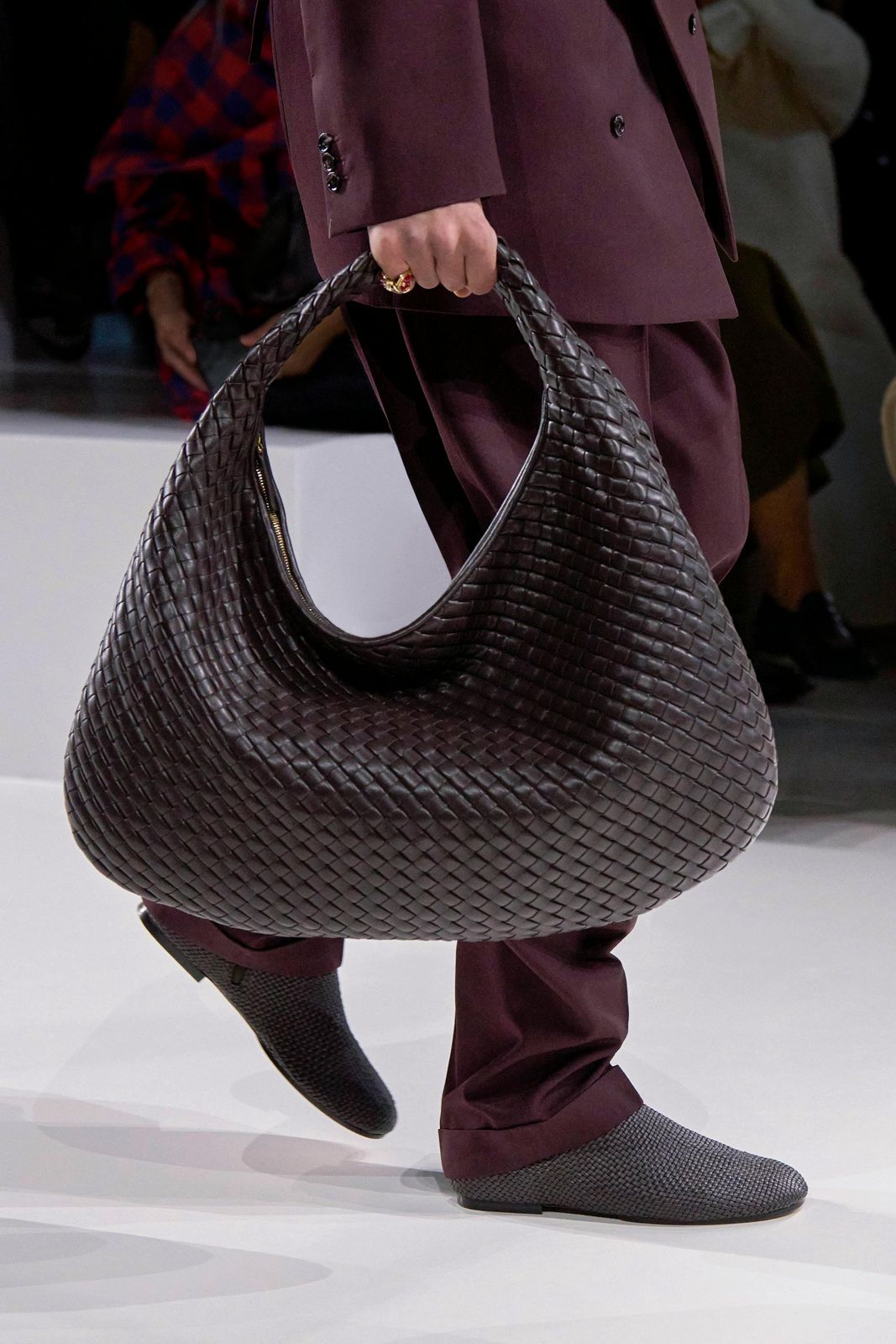 Maroon Suit with a Large Dark Brown Woven Hobo Bag Maroon Suit with a Large Dark Brown Woven Hobo Bag — Bottega Veneta Bag Outfits