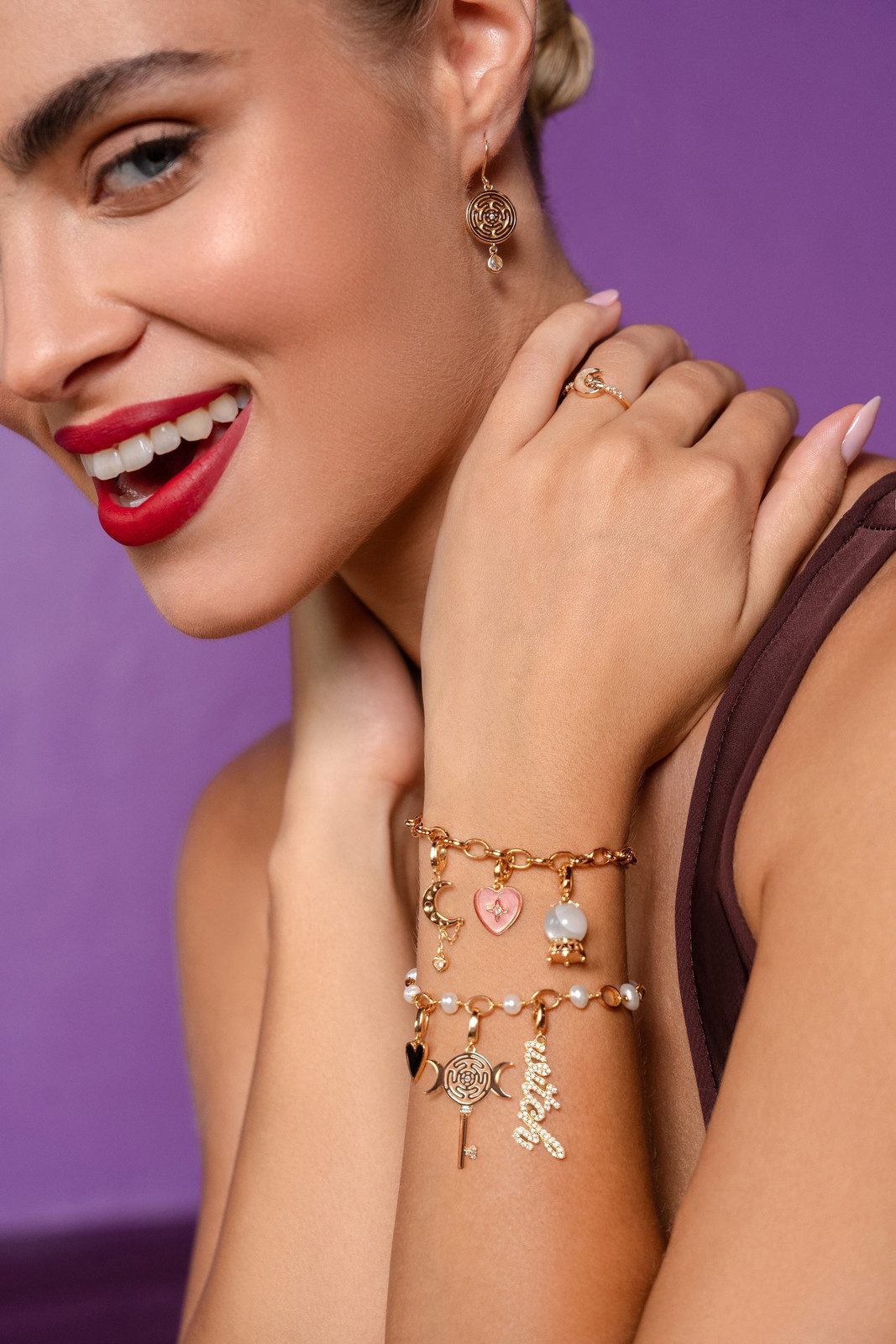 Stacked Charm Bracelets with Celestial and Animal Motifs Stacked Charm Bracelets with Celestial and Animal Motifs