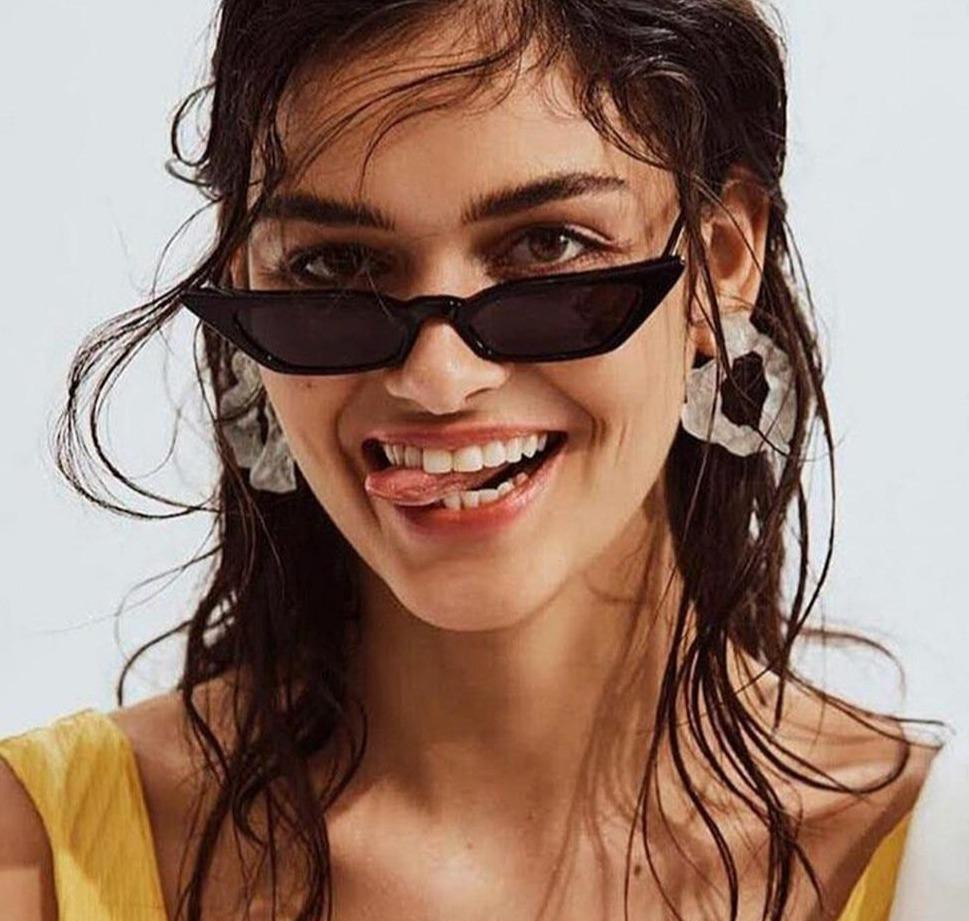Vibrant Yellow Top and Black Cat Eye Sunglasses with Statement Earrings Vibrant Yellow Top and Black Cat Eye Sunglasses with Statement Earrings — Cat Eye Sunglasses Outfits