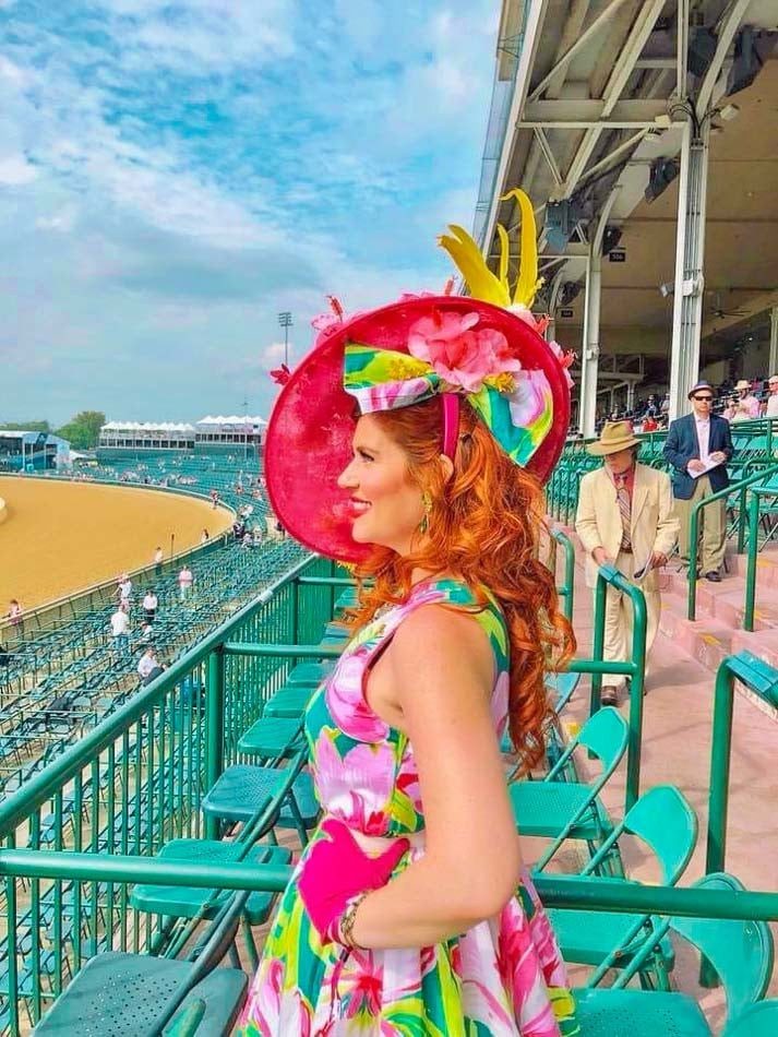 Vibrant Floral Dress with Large Bow-Adorned Hat — Kentucky Derby Outfits