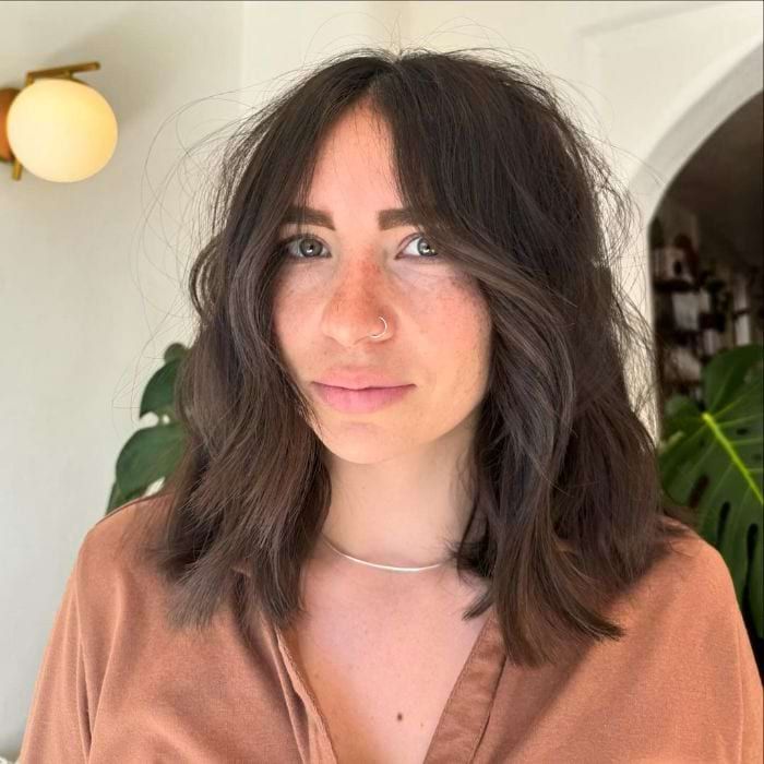 Collarbone Lob with Wispy Bangs Collarbone Lob with Wispy Bangs — Hairstyles for Diamond Faces
