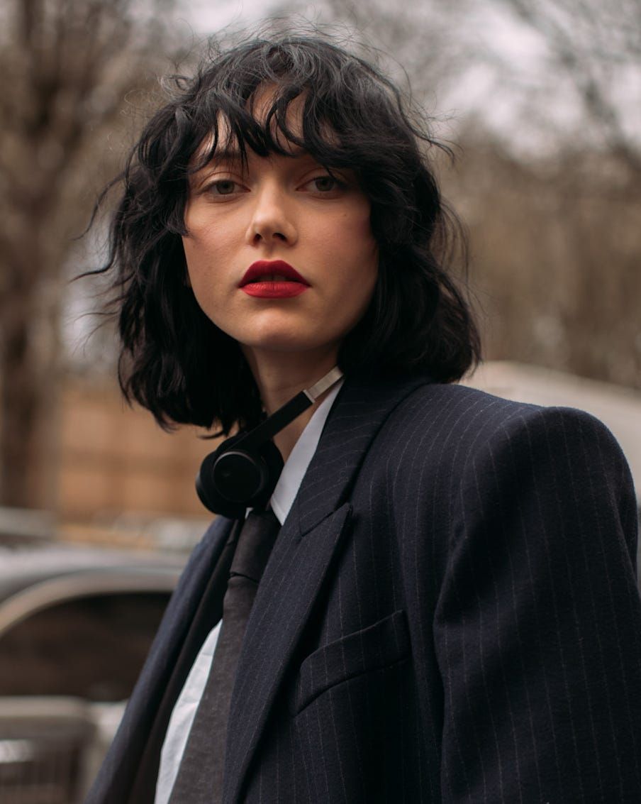 Chin-Length Dark Brown Bob With Choppy Bangs — Layered Bob