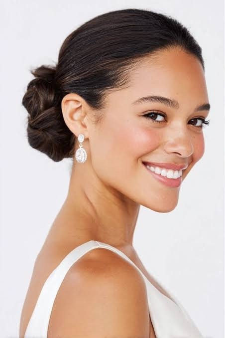 Effortless Dark Brown Messy Bun — Bachelorette Hairstyles