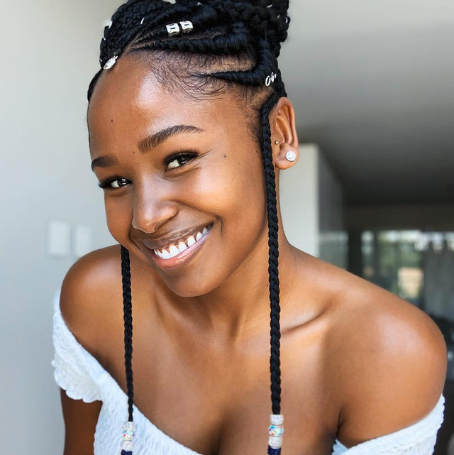 Cornrow Bun with Hanging Braided Strands Cornrow Bun with Hanging Braided Strands