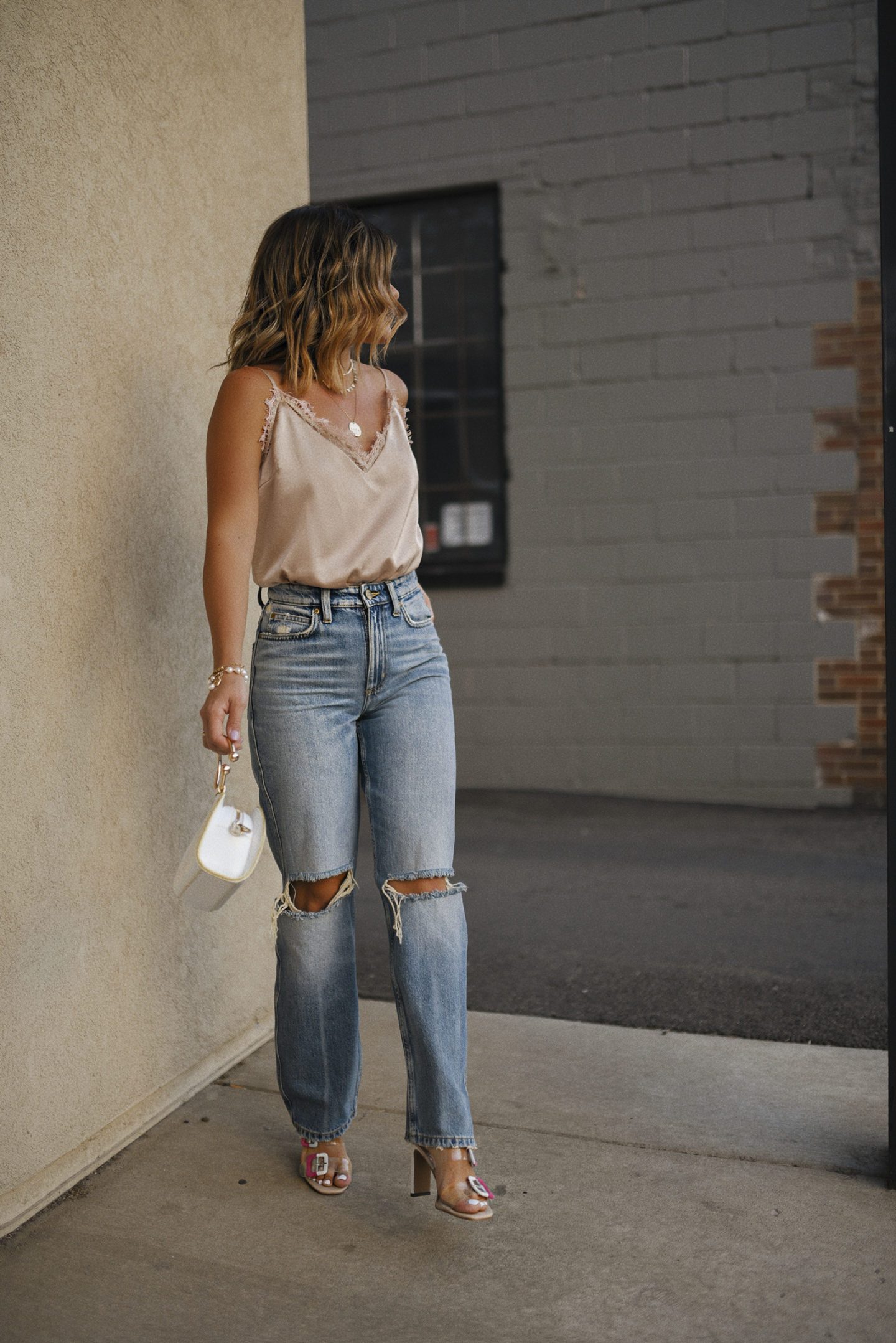 Light Blue Beige Gold White Ripped Light Wash Jeans with a Lace Camisole and Heels — Denim Outfits