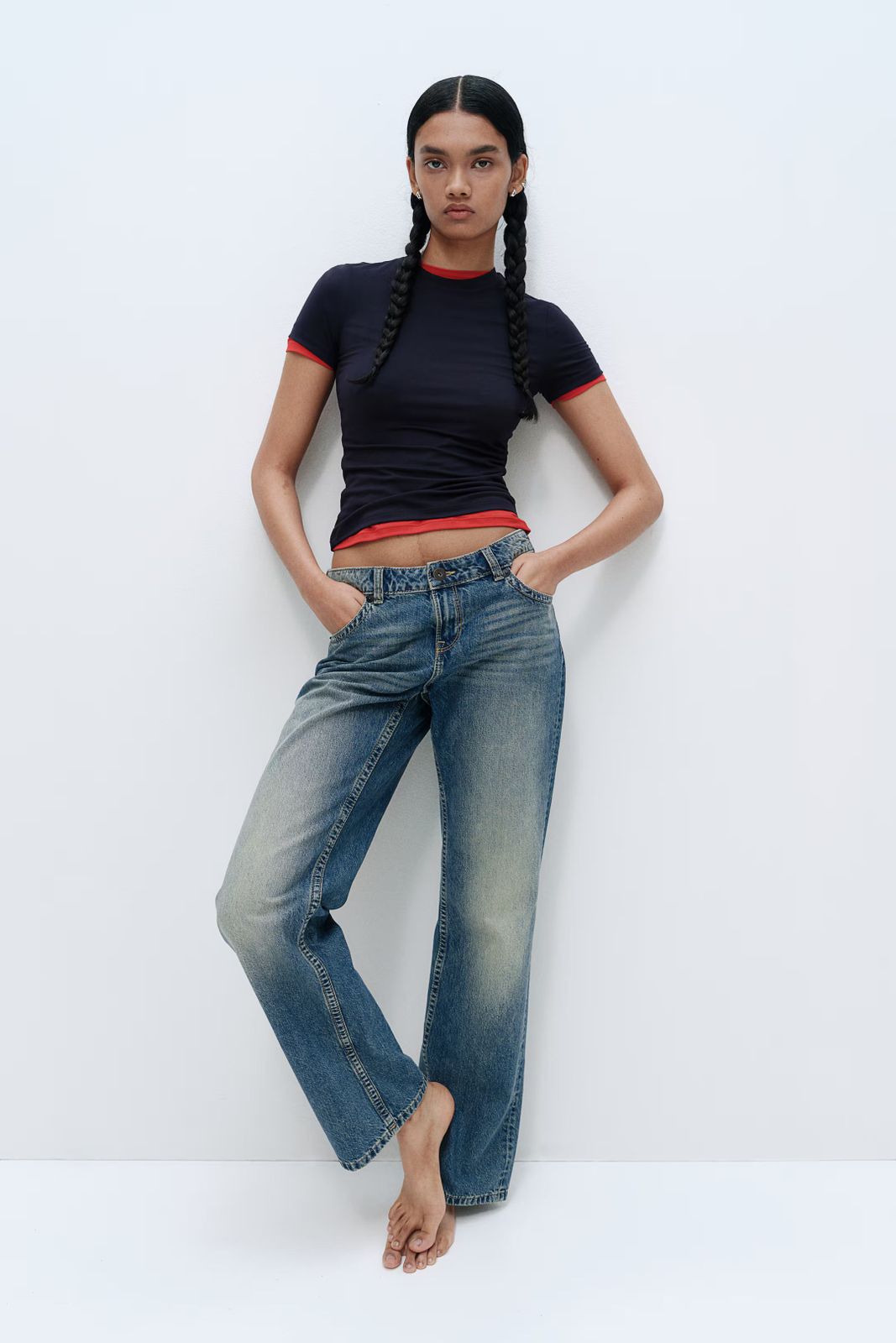 Navy T-Shirt and Medium Wash Low-Rise Jeans Navy T-Shirt and Medium Wash Low-Rise Jeans — Low Rise Jeans