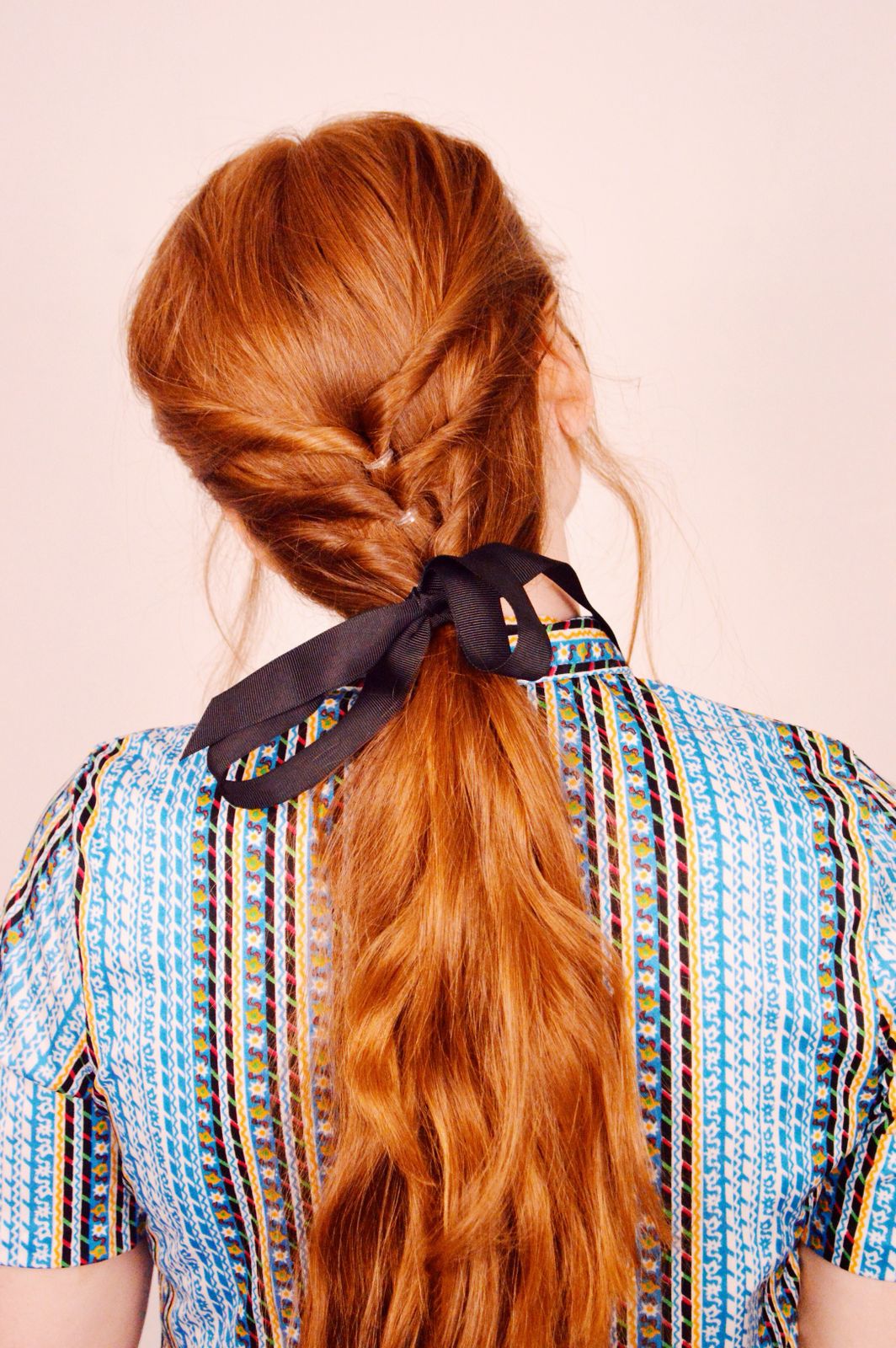 Vibrant Red Ponytail With Braided Detail — Low Ponytail with Bow