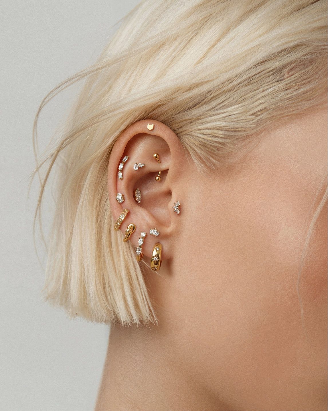 Sophisticated Ear Stack with Baguette-Cut Gem Studs Sophisticated Ear Stack with Baguette-Cut Gem Studs — Ear Piercing Ideas