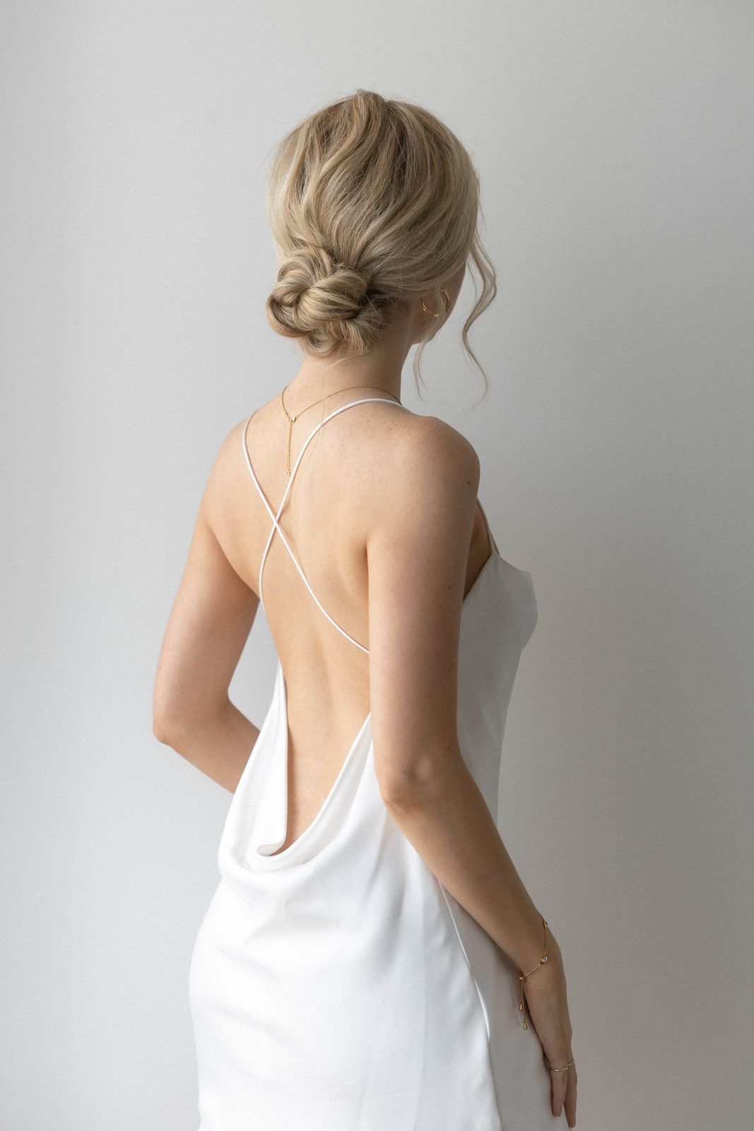 Collarbone Sleek Blonde Braided Bun — Braided Low Bun