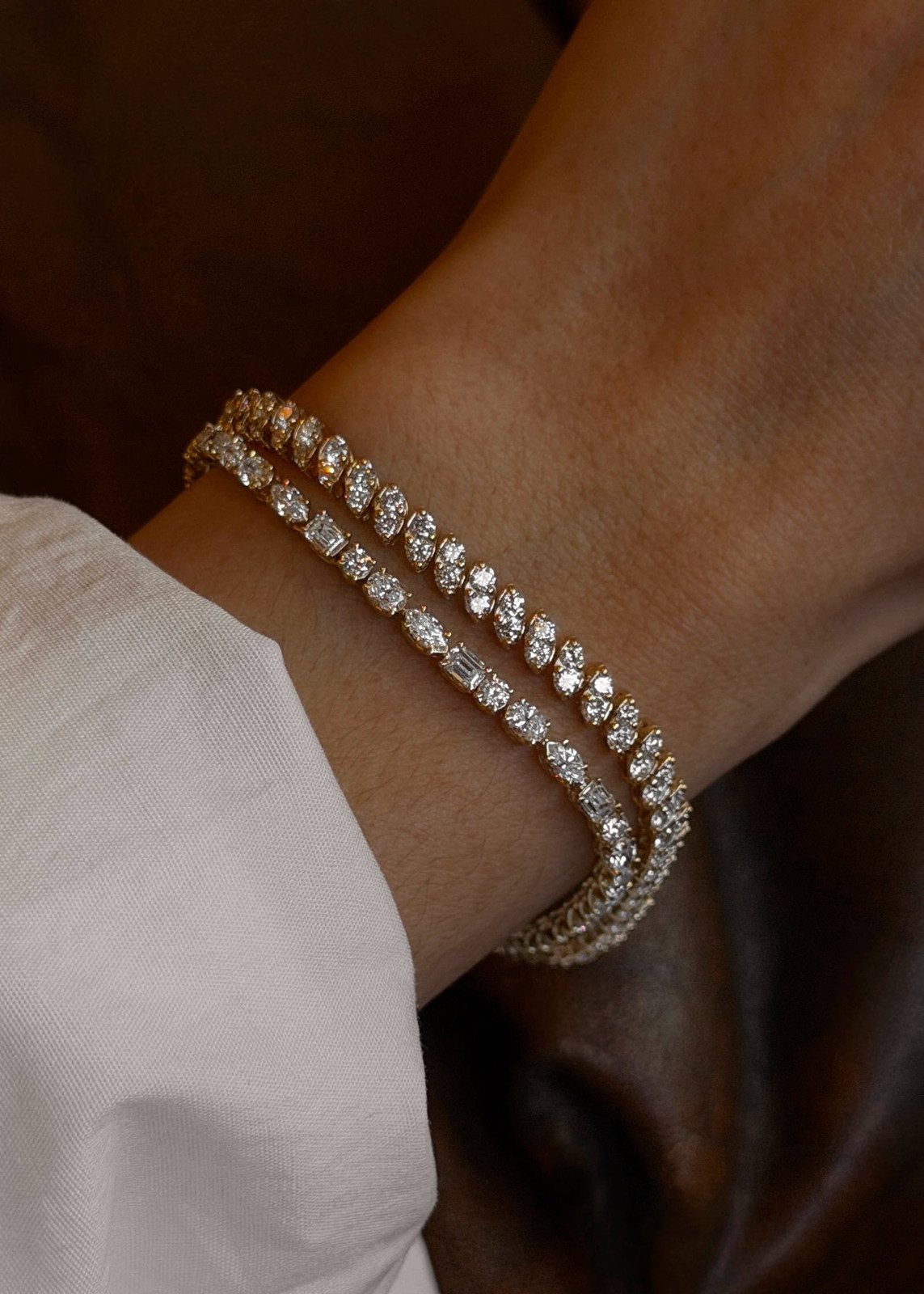 Layered Gold Bracelets with Crisp White Shirt Layered Gold Bracelets with Crisp White Shirt — Tennis Bracelets