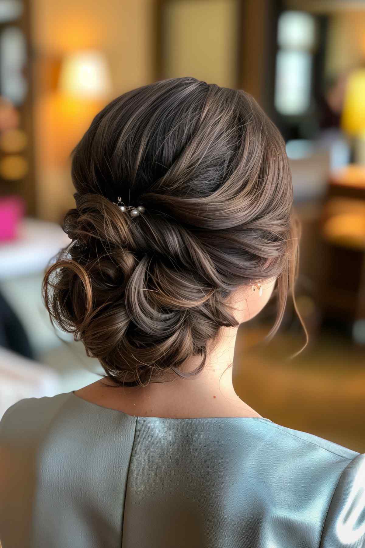 Elegant Low Bun with Sculpted Waves — Updos for Medium Hair