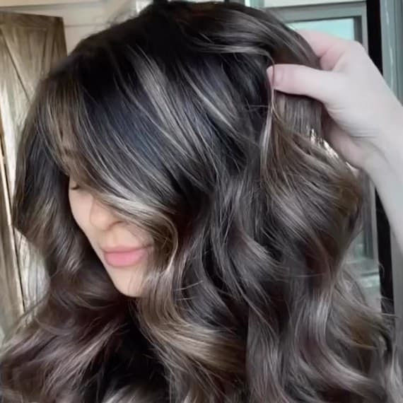 Mid-Back Flowing Ash Waves — Highlights on Black Hair